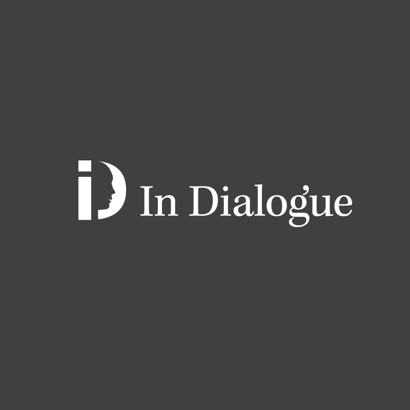 In Dialogue logo reverse on dark background