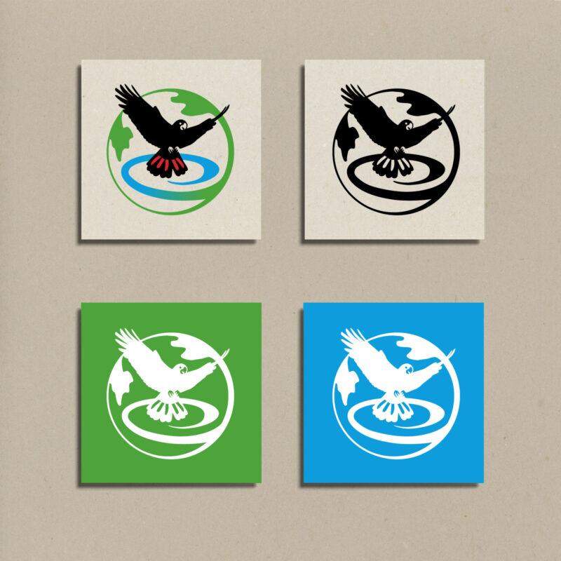Strategically Wild black cockatoo globe symbol shown in colour and black and white on brown card, green and blue.